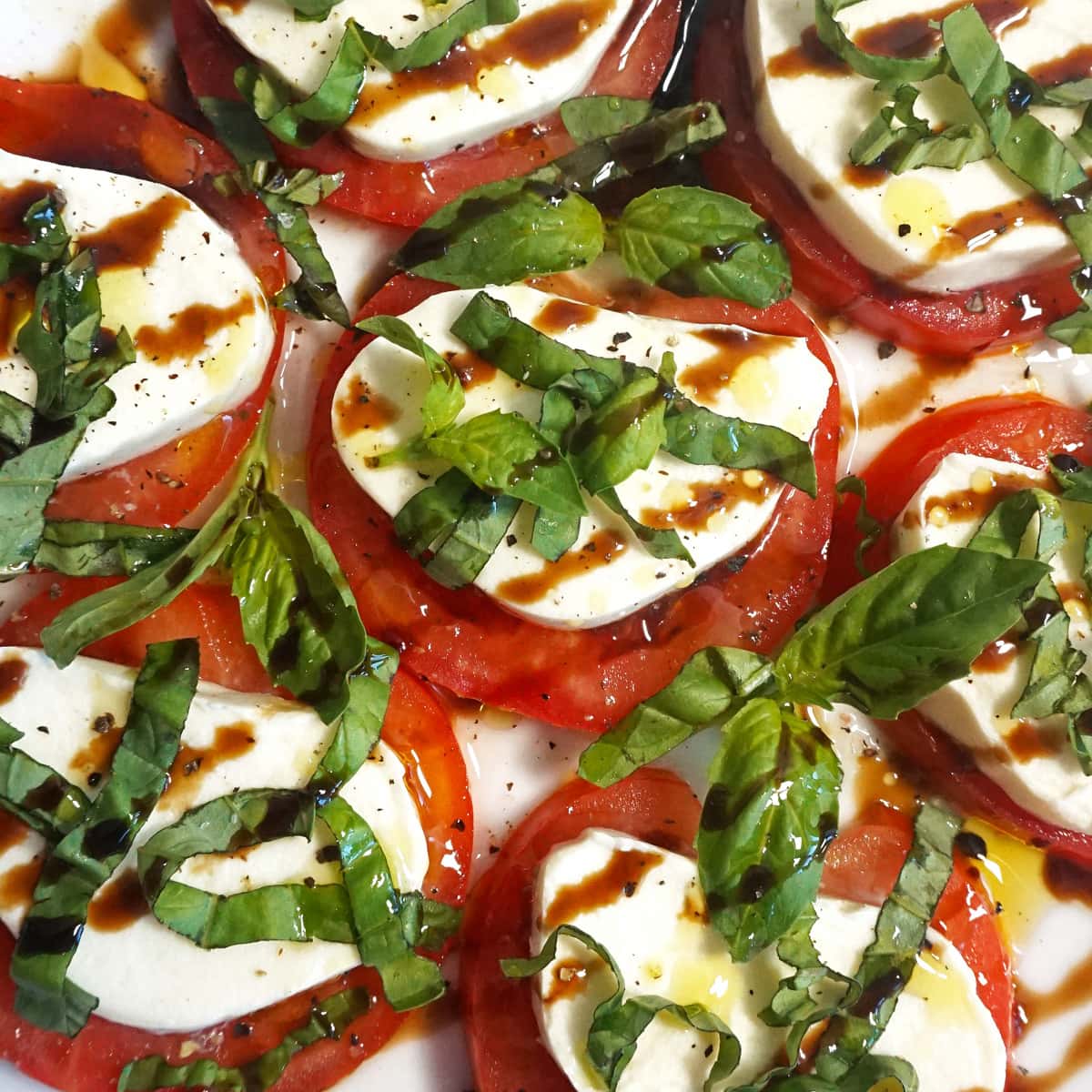 Caprese with balsamic glaze and olive oil