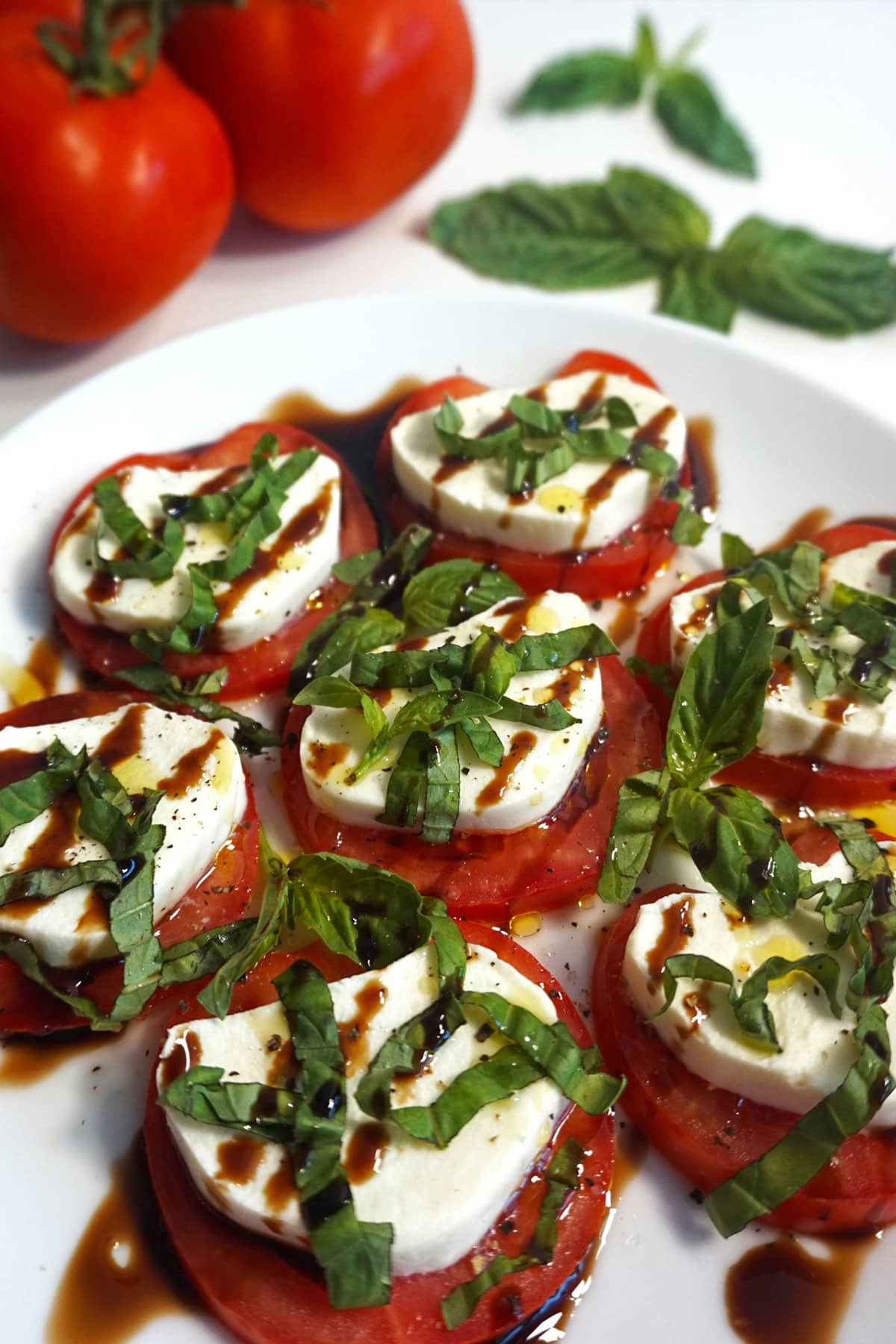 Caprese with balsamic glaze and olive oil