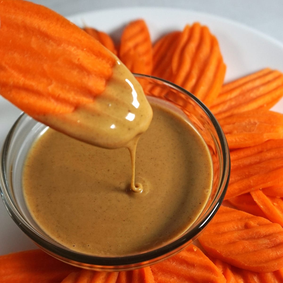 Keto snack: carrots and peanut butter mixed with MCT oil