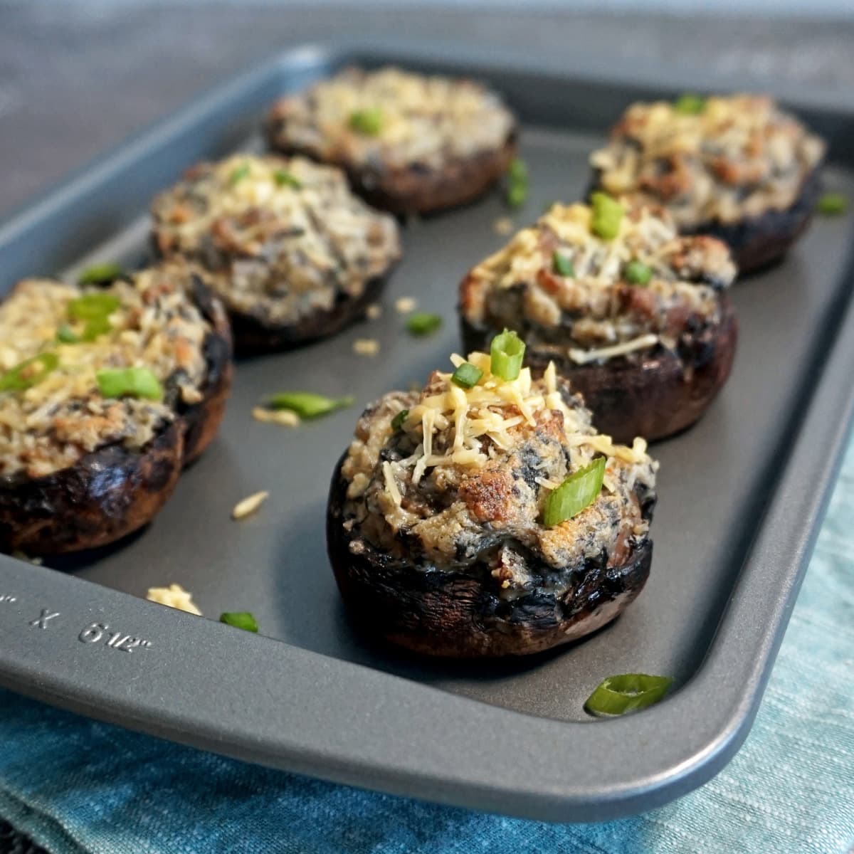 Stuffed mushrooms with bacon on a sheet pan