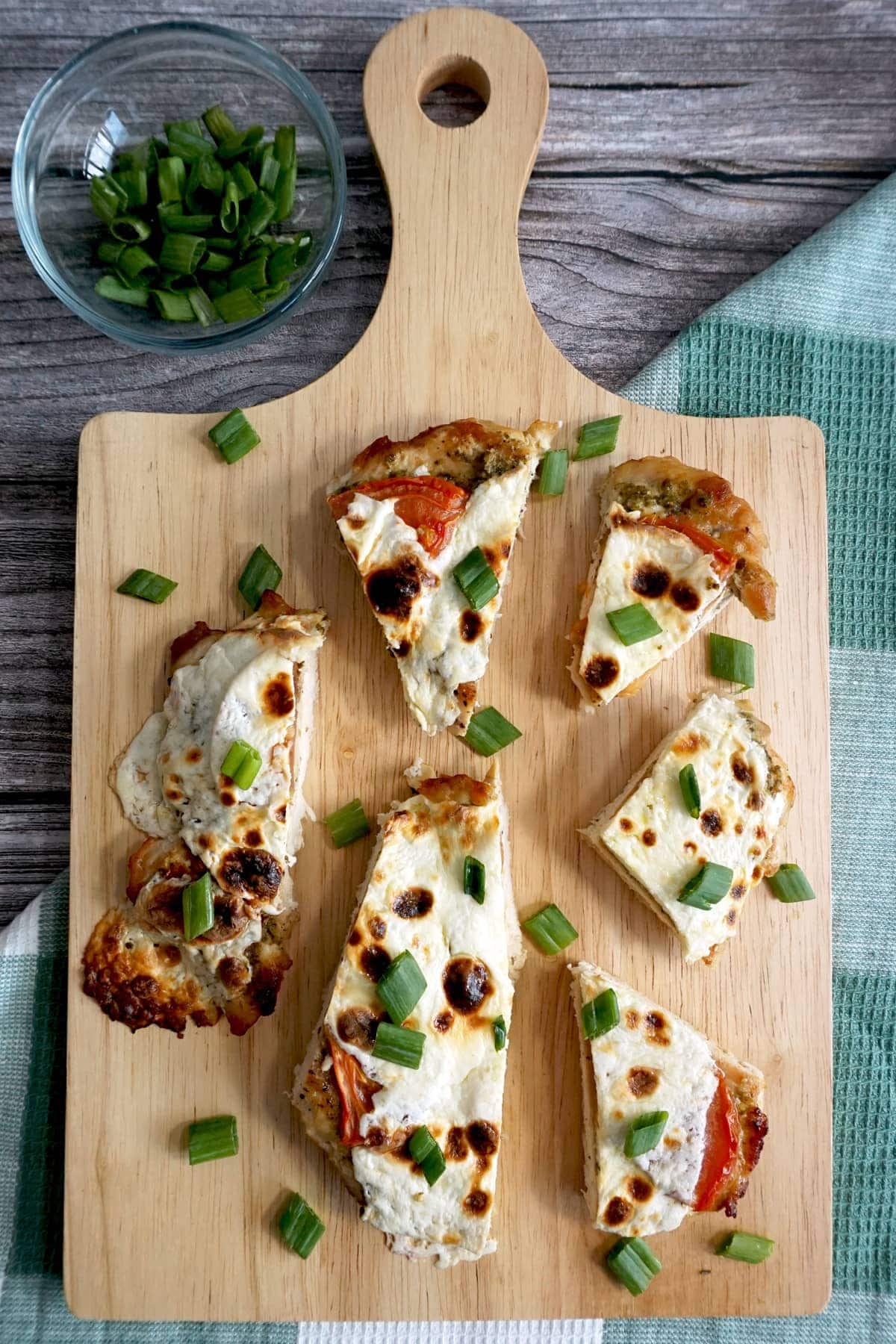 Keto Chicken Pesto Pizza cut into slices