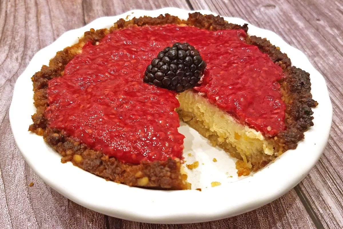 Raspberry Cheesecake with Macadamia Crust Slice