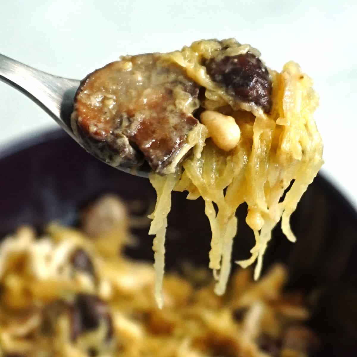 Spaghetti squash with mushroom alfredo fork