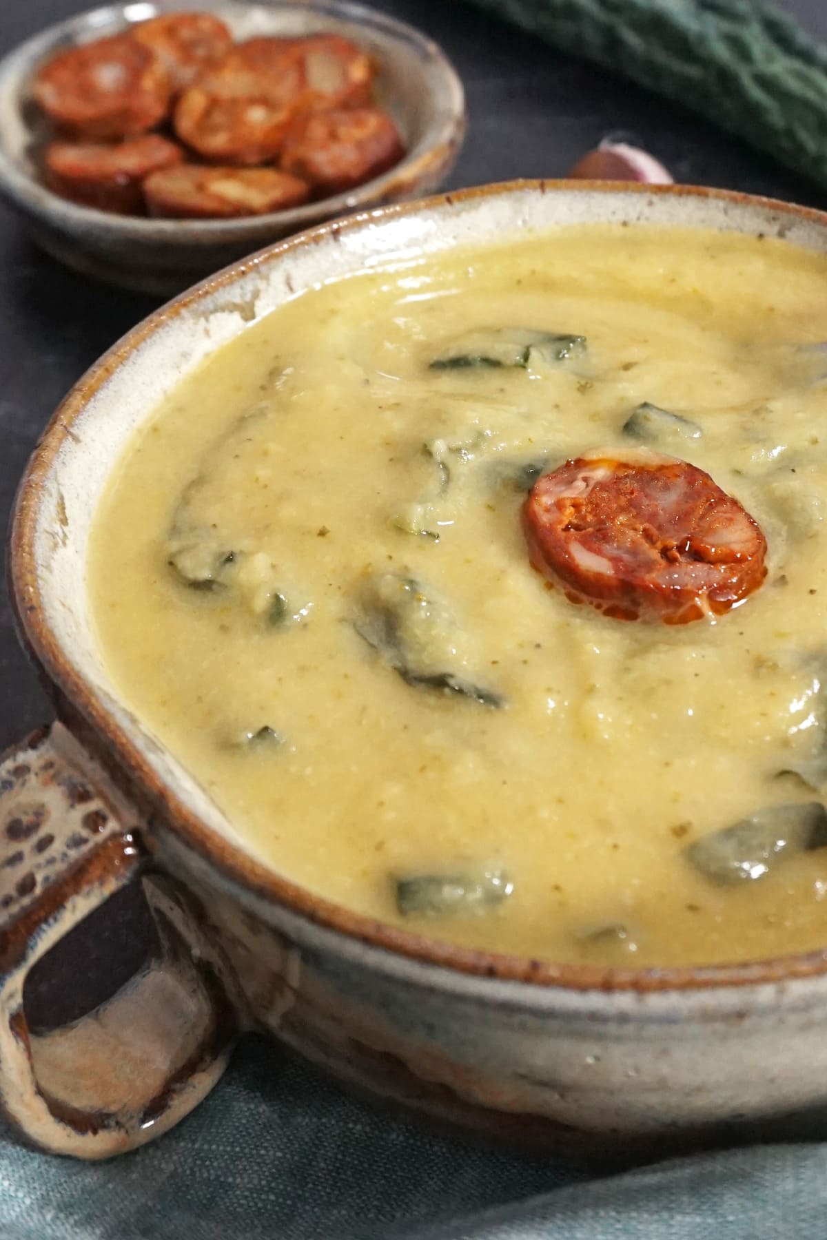 Closeup view of a bowl of caldo verde soup