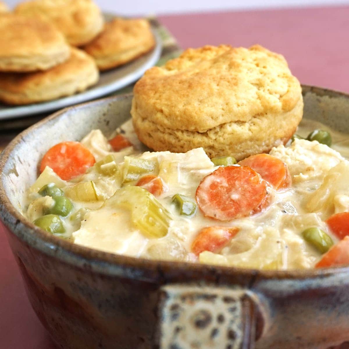 Crustless Chicken Pot Pie with a biscuit on the side
