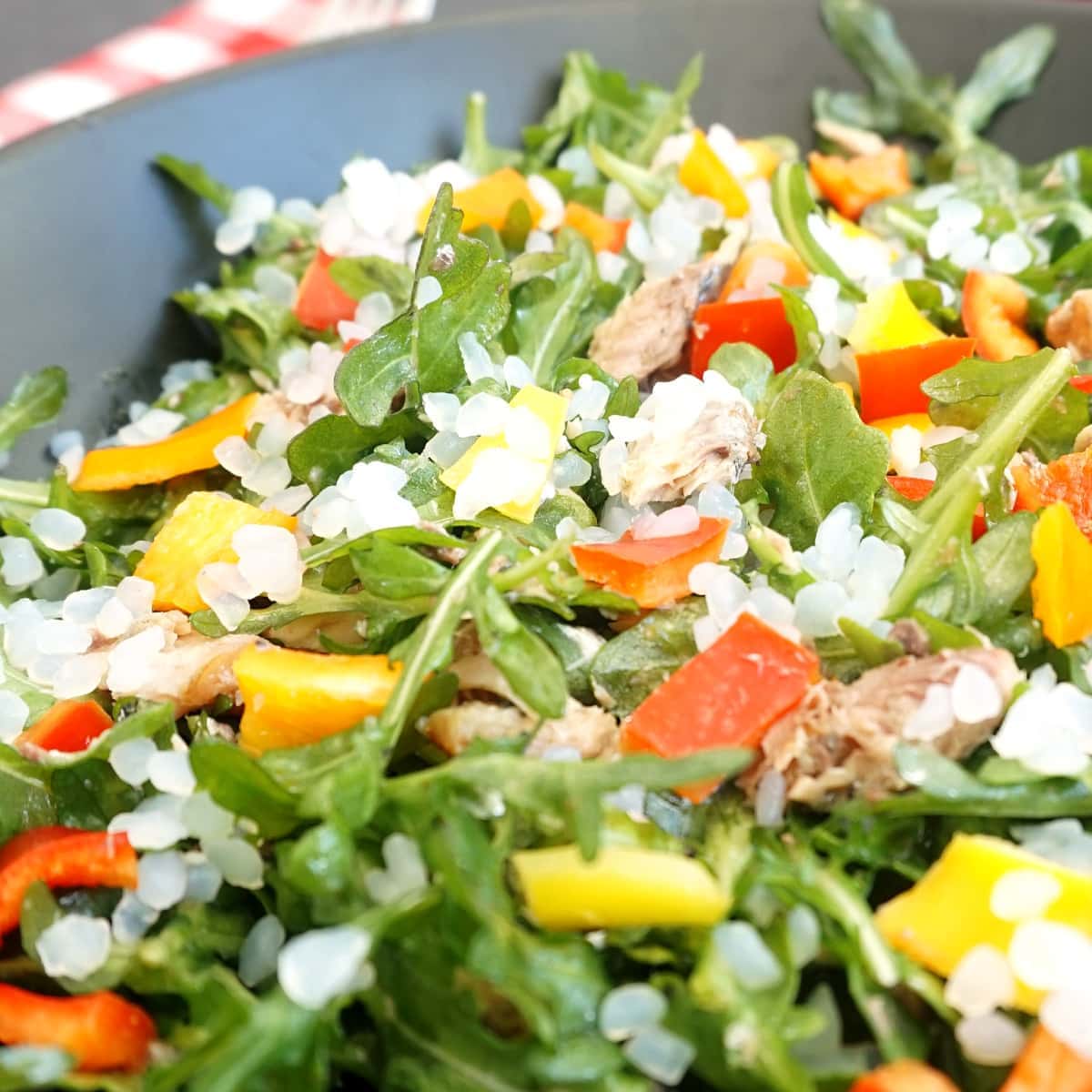 Close up of Sardine Salad arugula and peppers