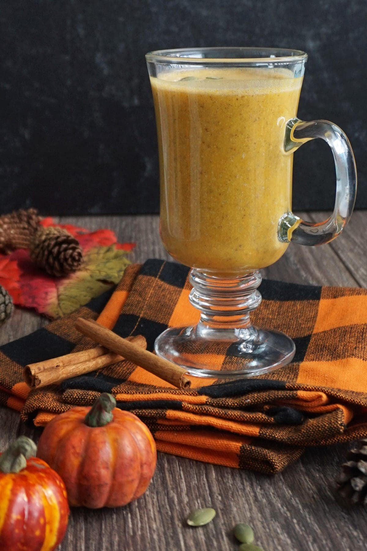 Cup of Low-Carb Pumpkin Spice Smoothie on an orange napkin